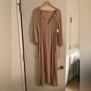 This is a vintage Free People dress, very on trend for 2025 summer